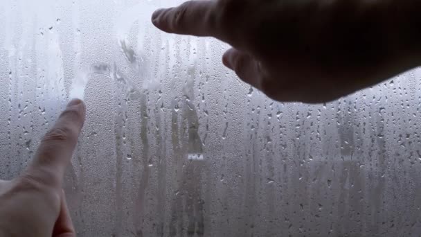 Woman Hands Drawing Fingers Two Hearts Wet Misted Window Heart — Stock video