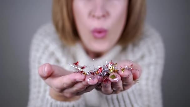 Happy Woman Blowing Shiny Colorful Confetti Hands Blurred Background Inglés — Vídeo de stock