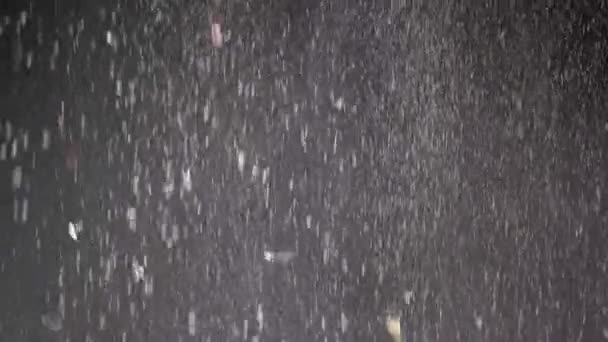 Stream Falling Confetti Dust Particles Snowfall Black Background Inglés Fondo — Vídeo de stock