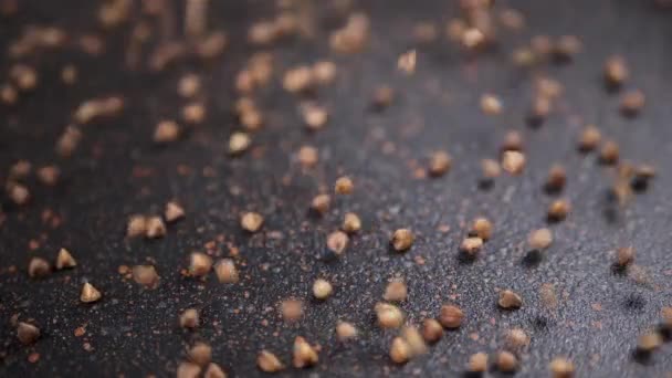 Grains Buckwheat Fall Black Background Slow Motion Close Raw Brown — Stock video