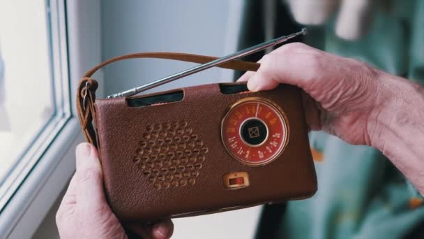 Male Fingers Adjust Frequency Old Vintage Retro Receiver Leather Case — Stock Video