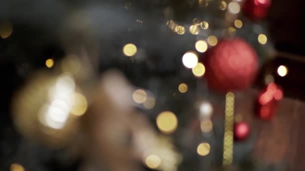 Lâmpadas Natal Cintilantes Brinquedos Fundo Árvore Natal Borrada Fundo Abstrato — Vídeo de Stock