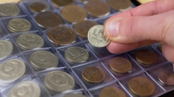 Collector Putting Old Collectible Coin Urss Cell Album Inglés Cerca — Vídeos de Stock