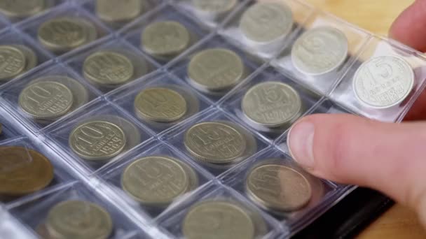 Hands Leafing Pages Numismatic Album Old Soviet Ussr Coins Закрывай — стоковое видео