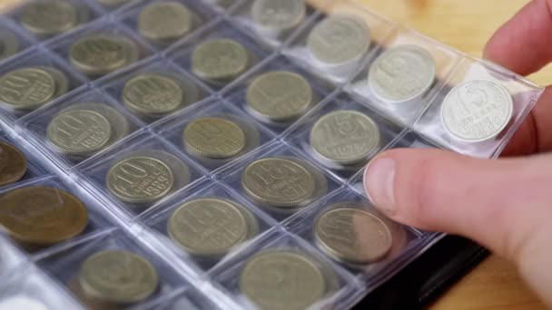 Hands Leafing Pages Numismatic Album Old Soviet Ussr Coins Inglês — Vídeo de Stock