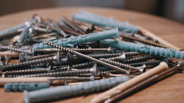 Lots Scattered Stainless Steel Fasteners Rotating Wooden Background Close Abundance — Stock Video