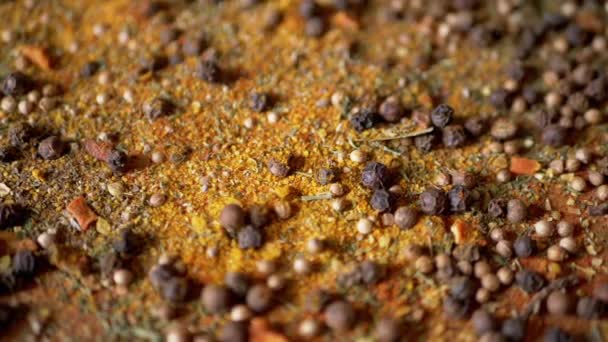 Scattered Various Multicolored Indian Dry Spices Rotating Wooden Background Allspice — Stock Video