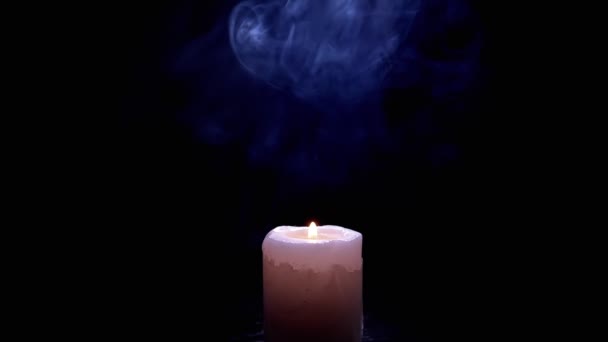 One White Wax Candle Burning Cloud Blue Smoke Een Zwarte — Stockvideo