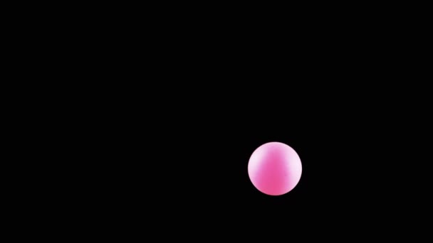 Розовый Маленький Теннисный Мяч Вращающийся Пространстве Копирования Черном Фоне Абстрактно — стоковое видео