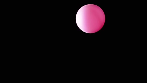 Roterende Roze Bal Bol Vliegt Lege Ruimte Een Zwarte Achtergrond — Stockvideo