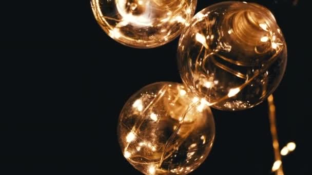 Lots Hanging Glowing Vintage Edison Light Bulbs Black Background Bottom — Stock Video