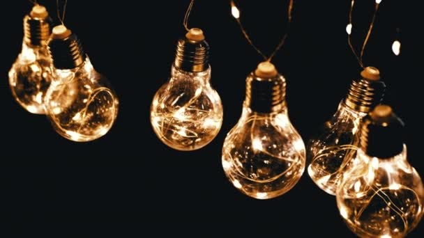 Lots Hanging Glowing Vintage Edison Light Bulbs Black Background Top — Stock Video