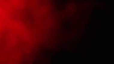 Kızıl Duman 'ın patlaması ya da Siyah Bulanık Arkaplanda Toz. Soyut, yan görüş. Kırmızı yumuşak duman veya buhar kaotik bir şekilde boş uzayda karışıyor. Parçacık patlaması, parlak ışık. Yavaş çekim.
