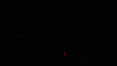 Siyah arka planda hafif bulanık bir etkisi olan çapraz kırmızı kıvılcımlar. Bu dinamik görsel gizem ve entrika katıyor.