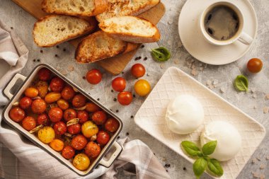 Lunch idea - burrata cheese with baked tomatoes and toasts.  