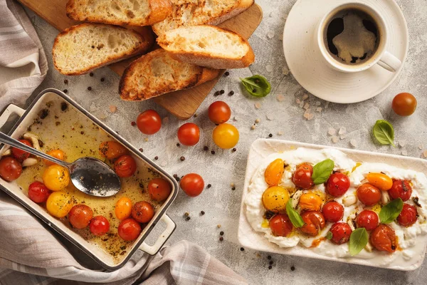 Lunch idea - burrata cheese with baked tomatoes and toasts.  