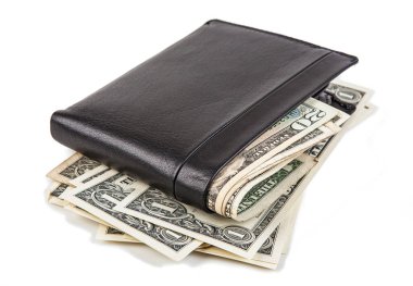 black leather wallet with banknotes lying on a white background
