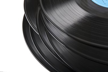 stack of vinyl records with music
