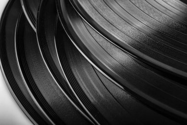 stack of vinyl records with music