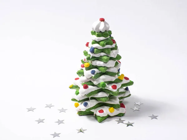 stock image Green cookie christmas tree made by cookies on white background with small stars. New Year Christmas card. Matcha Green Tea Gingerbread Christmas tree Cookies covered with white chocolate. Copy space.