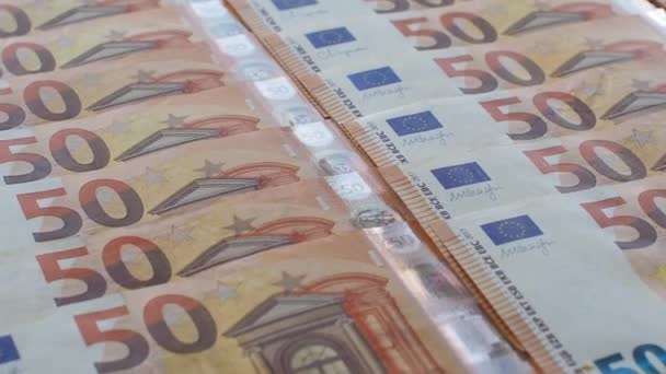 顔の価値が50ユーロの欧州連合 のお金のセット コピースペースを持つ50ユーロ紙幣の背景 企業の設備投資 銀行の概念 — ストック動画