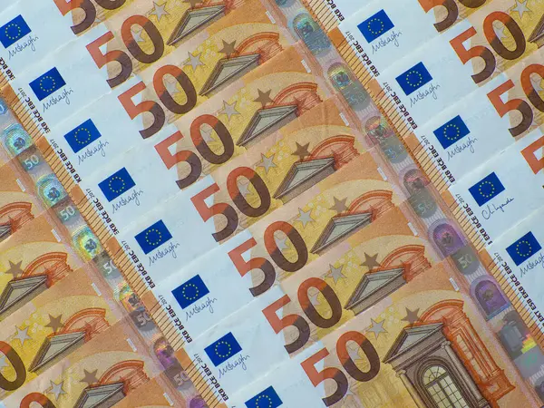 A set of European Union money with a face value of 50 euros. Background of the fifty euros banknotes with copy space. Enterprise capital investment, finance, savings, corruption and bank concept.