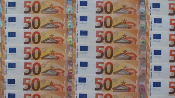 顔の価値が50ユーロの欧州連合 のお金のセット コピースペースを持つ50ユーロ紙幣の背景 企業の設備投資 銀行の概念 — ストック動画