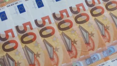Set of European Union money with a face value of 50 euros. Background of the fifty euros banknotes and 2024 with copy space. Enterprise capital investment, finance, savings, bank and New Year concept