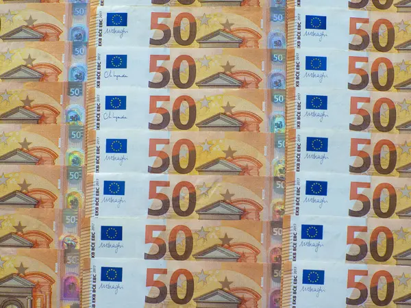 A set of European Union money with a face value of 50 euros. Background of the fifty euros banknotes with copy space. Enterprise capital investment, finance, savings, corruption and bank concept.