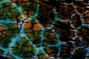 Geometri tekerrür deseni, doku arka planı, renkli desen çalışması ve tekstil deseni. Moda baskısı. Moda ve şık bir arka plan. Renkli dalgalı parlak yüzey dokusu.