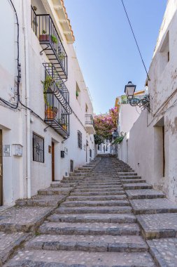An old atmospheric city with narrow and cramped quiet streets and stairs