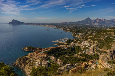 View of the Calpe peninsula in Spain with the Calp peak and the city in the background