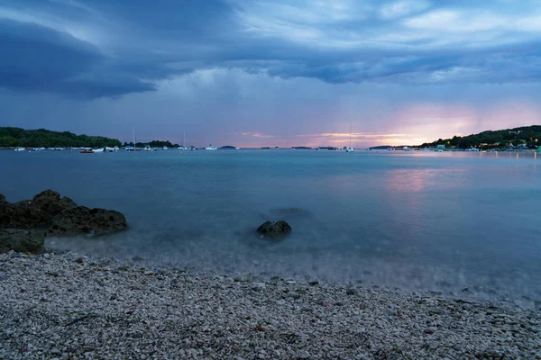 Beautifully blurred sea waves during sunset