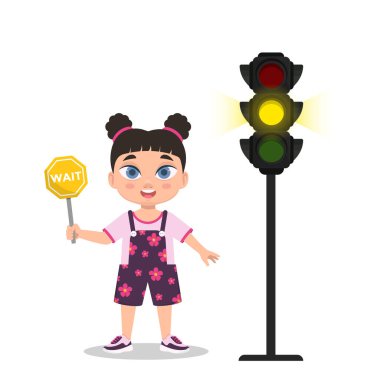 Çocuğun elinde beklemek için bir işaret var Trafik ışığı sarı bir sinyal gösteriyor.