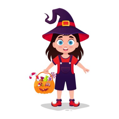 Cadı gibi giyinmiş kız şekerle