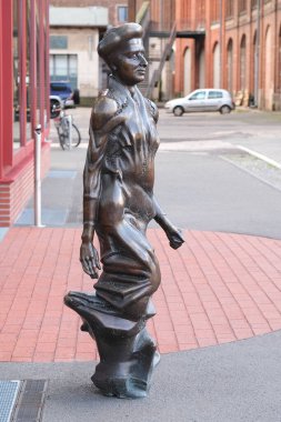 Berlin, Germany, January 5, 2023, bronze statue of Rosa Luxemburg in front of the building of the foundation of the same name.