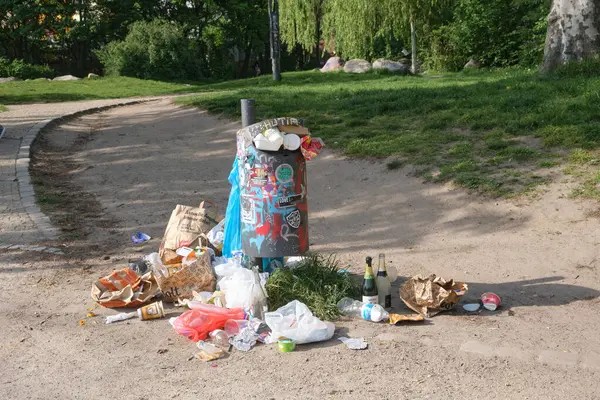 stock image Berlin Germany, April 29, 2024, overfilled waste garbage can