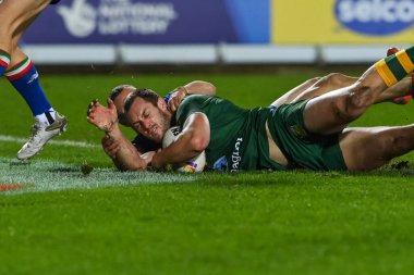 Avustralyalı Isaah Yeo, Rugby Ligi Dünya Kupası 2021 karşılaşmasında Avustralya ile İtalya arasında 29 Ekim 202 'de St Helens, Birleşik Krallık' ta oynanan Wicked Stadyumu karşılaşmasına katılıyor.