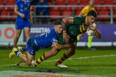 Avustralyalı Latrell Mitchell, 29 Ekim 202 'de İngiltere' nin St Helens kentinde oynanan 2021 Dünya Rugby Ligi Kupası karşılaşmasında Avustralya ile İtalya 'nın karşı karşıya geldi.