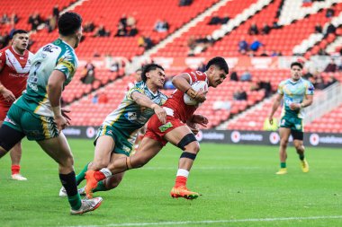 Tonga takımından Isaiya Katoa, 30 Ekim 202 'de İngiltere' nin Middlesbrough kentinde oynanan Rugby Ligi Dünya Kupası 2021 Grubu D Grubu karşılaşmasında yarıştı.