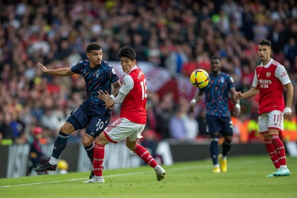 stock image Morgan Gibbs-White #10 of Nottingham Forest  keeps the ball in play during the Premier League match Arsenal vs Nottingham Forest at Emirates Stadium, London, United Kingdom, 30th October 202