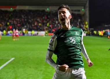 Gol Plymouth Argyle forveti Ryan Hardie (9), 31 Ekim 202 tarihinde İngiltere 'nin Plymouth kentinde oynanan Sky Bet 1 karşılaşmasında 3-2' lik galibiyet golünü kutluyor.