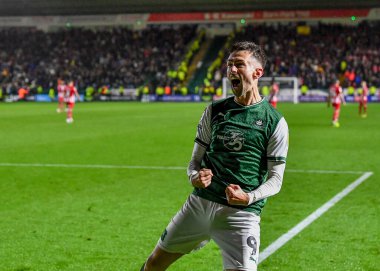 Gol Plymouth Argyle (9), 31 Ekim 202 'de İngiltere' nin Plymouth kentinde oynanan Sky Bet 1 karşılaşmasında 4-2 'lik galibiyet golünü kutluyor.