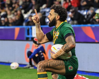 Avustralyalı Josh Addo-Carr, 4 Kasım 202 'de John Smith Stadyumu' nda oynanan 2021 Dünya Rugby Ligi çeyrek final karşılaşmasında denemelerini kutluyor.