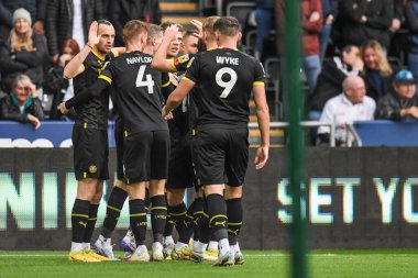 Wigan Atletizm 'den 10 numaralı Keane, 5 Kasım 202' de Swansea.com Stadyumu 'nda oynanan Swansea City vs Wigan Athletic maçında 0-1' lik galibiyet golünü kutlayacak.