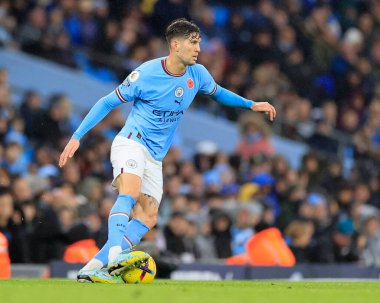 Manchester City 'den John Stones # 5 Premier League maçında topu kontrol ediyor Manchester City, Manchester Stadyumu' nda Fulham 'a karşı, 5 Kasım 202