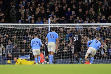 Erling Haaland #9 of Manchester City scores to make it 2-1 during the Premier League match Manchester City vs Fulham at Etihad Stadium, Manchester, United Kingdom, 5th November 202 clipart