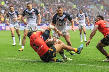 İngiltere 'den Tommy Makinson, 5 Kasım 202' de İngiltere 'nin Wigan, İngiltere' deki DW Stadyumu 'nda Papua Yeni Gine' ye karşı oynadığı Rugby Ligi Dünya Kupası 2021 Çeyrek final maçına gidiyor.
