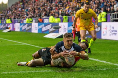 İngiliz Tommy Makinson, İngiltere 'nin Wigan, İngiltere' deki DW Stadyumu 'nda oynadığı 2021 Dünya Kupası çeyrek final maçında beşinci kez gol attı.