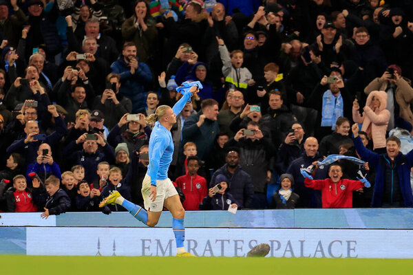 Erling Haaland #9 of Manchester City    celebrates scoring the winning goal in the 2-1 victory in the Premier League match Manchester City vs Fulham at Etihad Stadium, Manchester, United Kingdom, 5th November 202